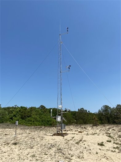 Photo of tall weather station at Jockey's Ridge State Park. 