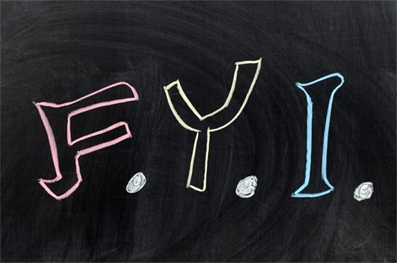 Pink, yellow, and blue letters FYI on chalkboard.